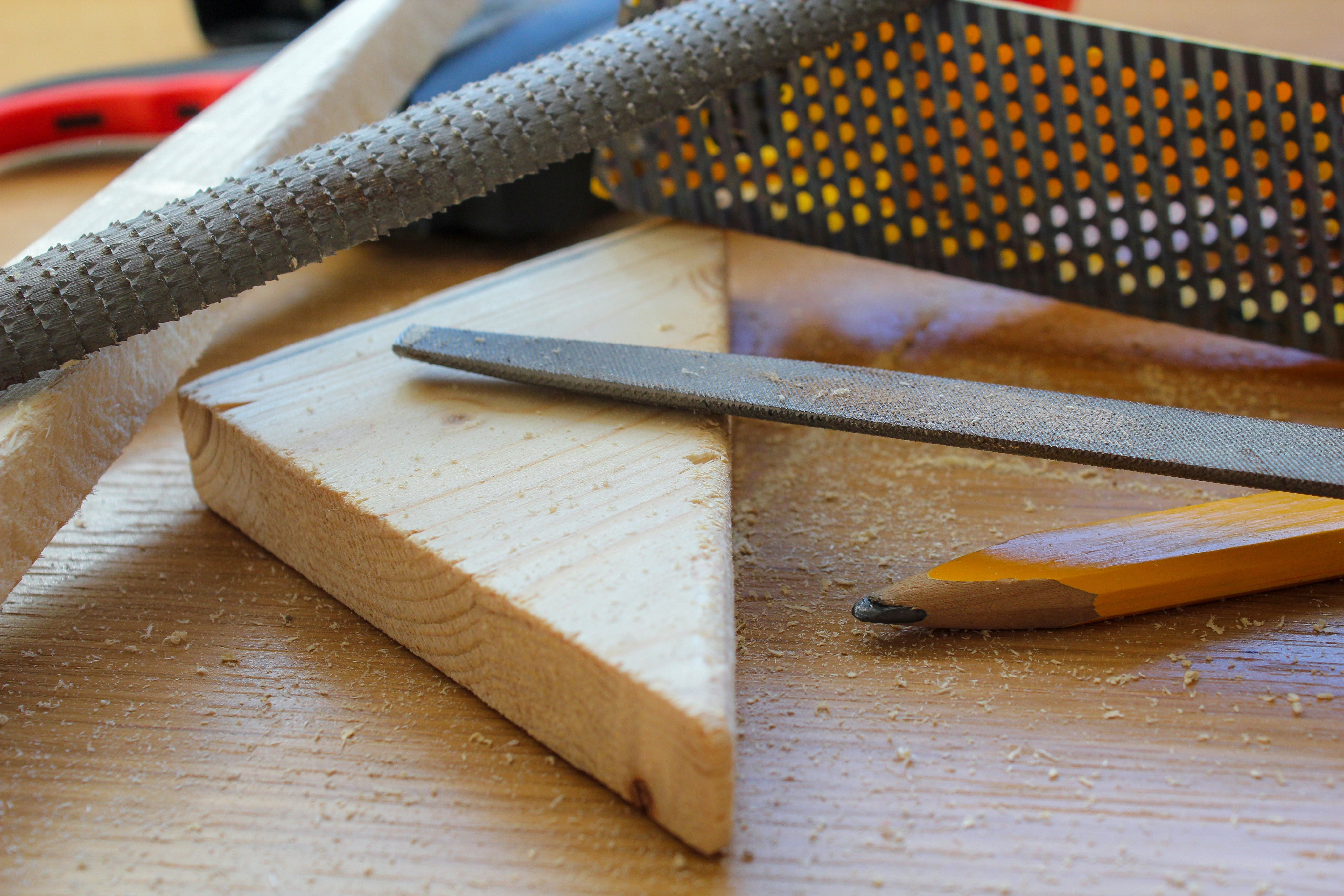 wood-working-tools-laid-on-a-bench.jpg